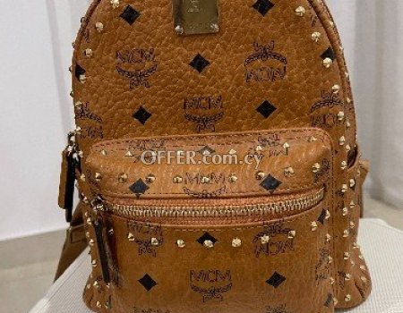 Authentic MCM stark backpack in studded outline visetos. In excellent condition -like new.